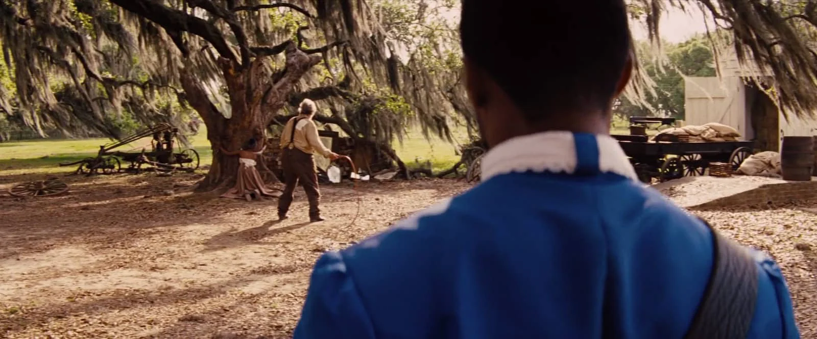 A dirty two shot connects Django and Brittle, and sets up the wide shot.